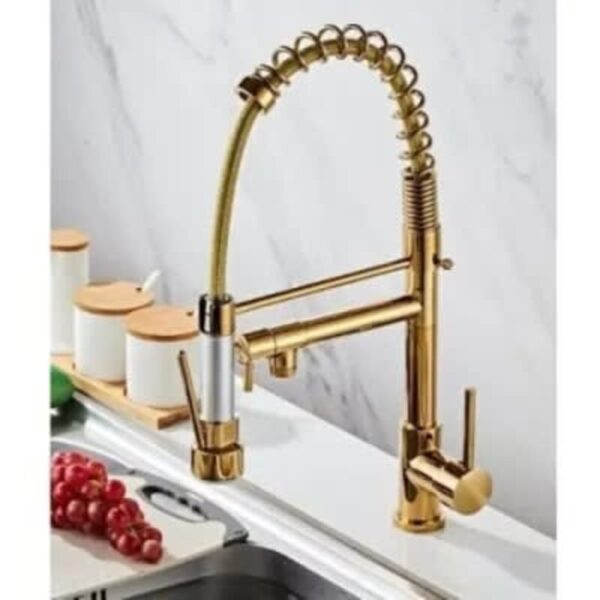 a gold kitchen tap on a counter
